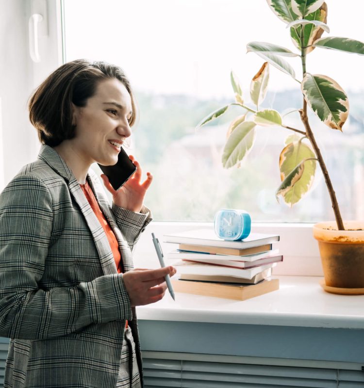 legal-business-consultant-legal-advisor-female-lawyer-businesswoman-talking-on-cell-phone.jpg